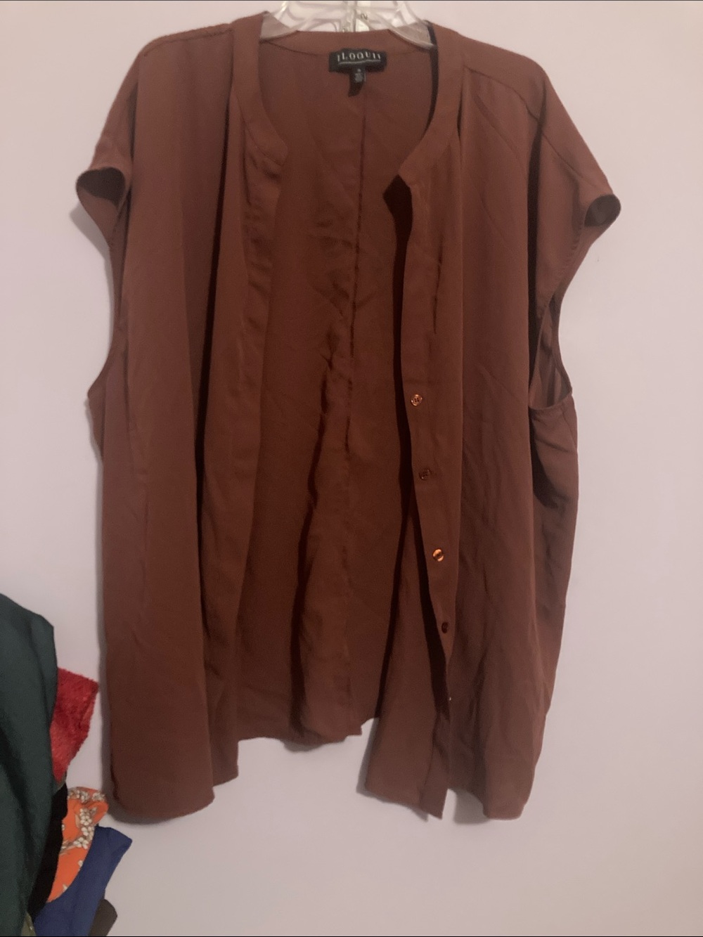 Eloquii sleeveless button-front blouse in brown